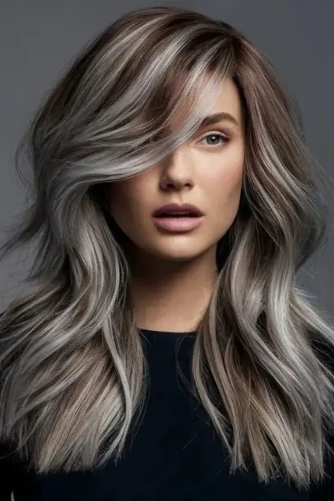 Subtle cool blonde highlights framing face.