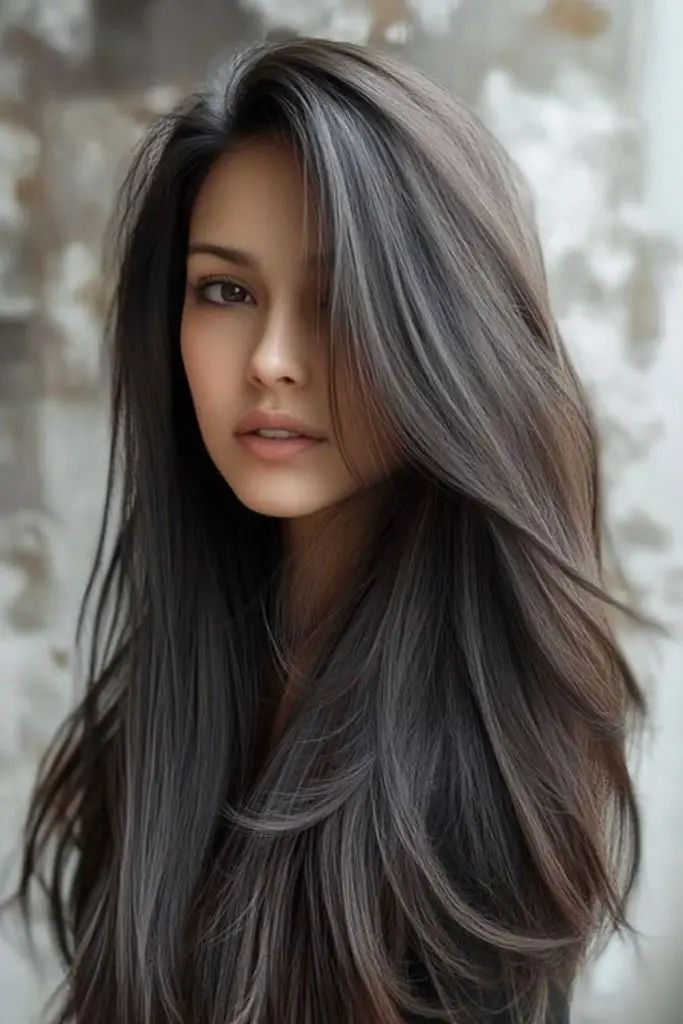 Soft, flowing layers frame delicate features.