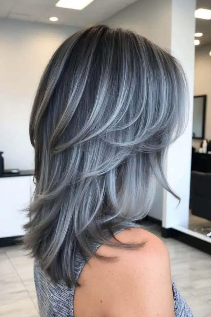Light feathered blonde highlights on gray.