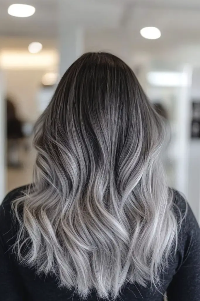 Frosted balayage highlights for silver hair.