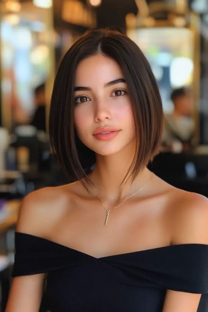 Smooth flowing bob with angled silhouette.