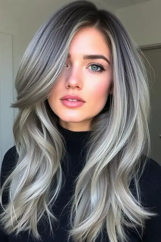 Soft pearlescent blonde over cool gray.
