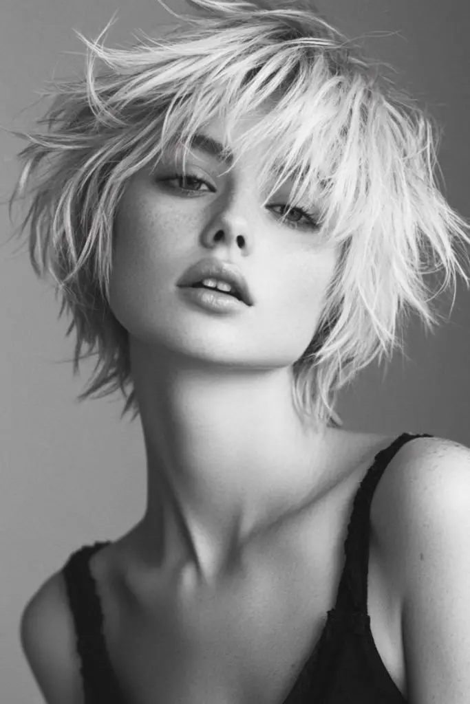 Wavy, tousled bob with flowing texture.