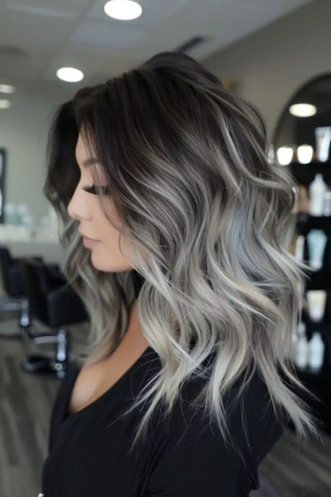 Glossy pearl blonde over silver strands.