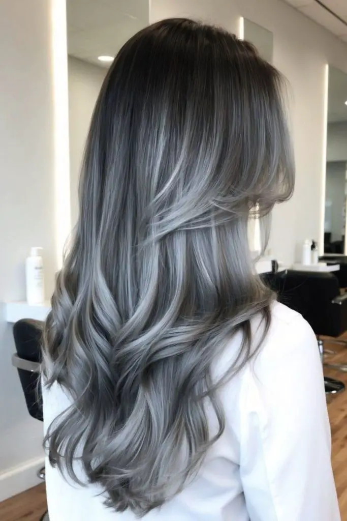 Soft platinum balayage on silver hair.