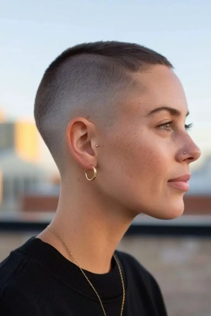 Ultra-short faded buzz cut, fierce.
