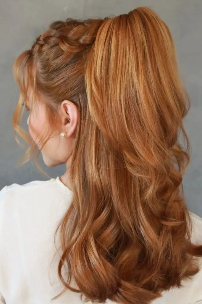 Voluminous ponytail with wild wavy ends.