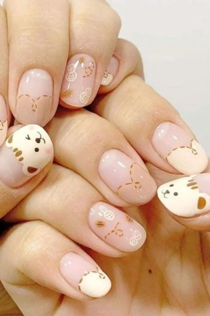 Beige nails with sleepy bear art