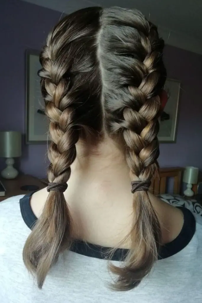 Two tight braids for a secure look.