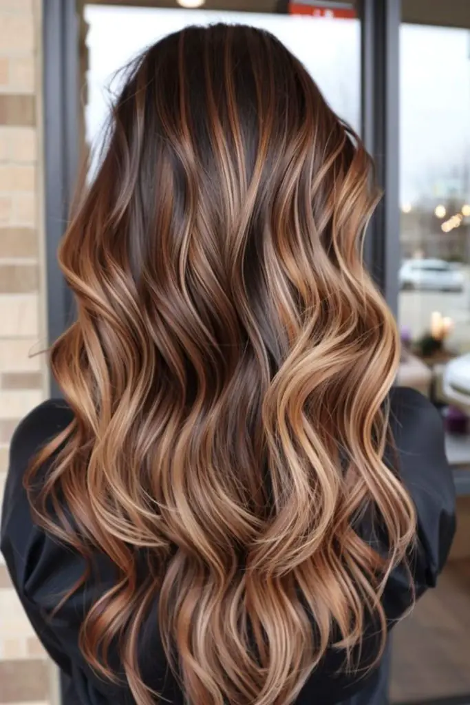Frosty walnut balayage in long waves