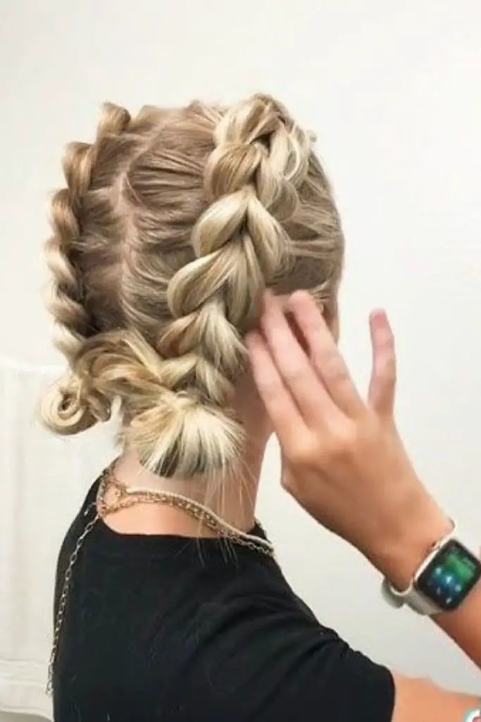 Interwoven Dutch braids for strong hold.