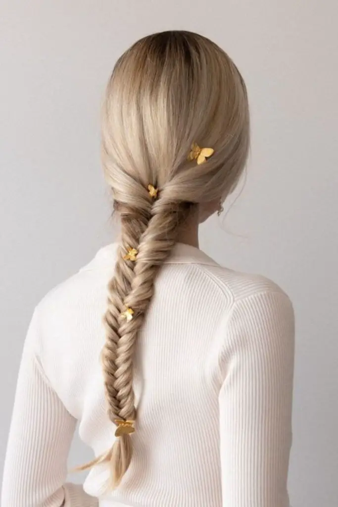 Light gossamer-threaded fishtail braid look.