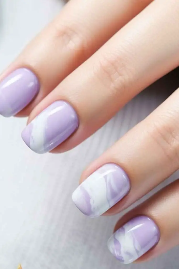 Lavender nails with white drip icing