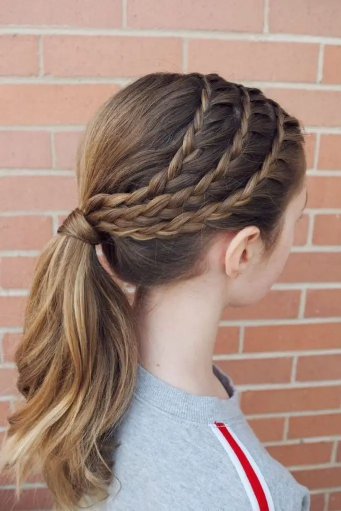 Deep side part with slicked locks.