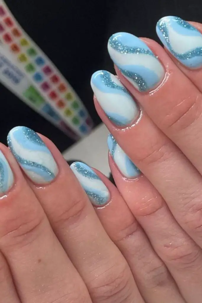 Blue shimmer nails with wave texture