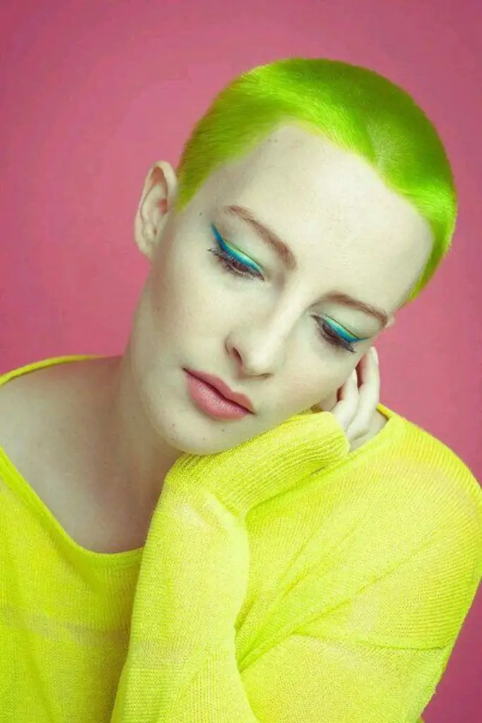 Neon buzz cut with bold color.