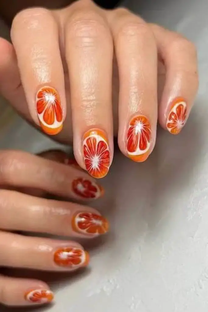Apricot brushstroke design on soft nails.