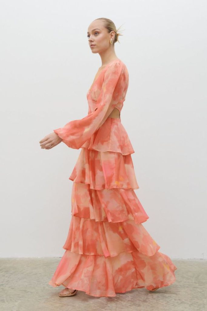 "Apricot tie-dye dress with tiered layers."