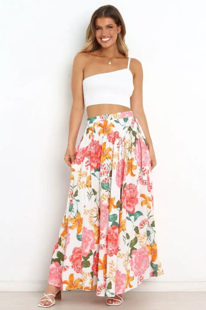 Tube top and coral skirt.