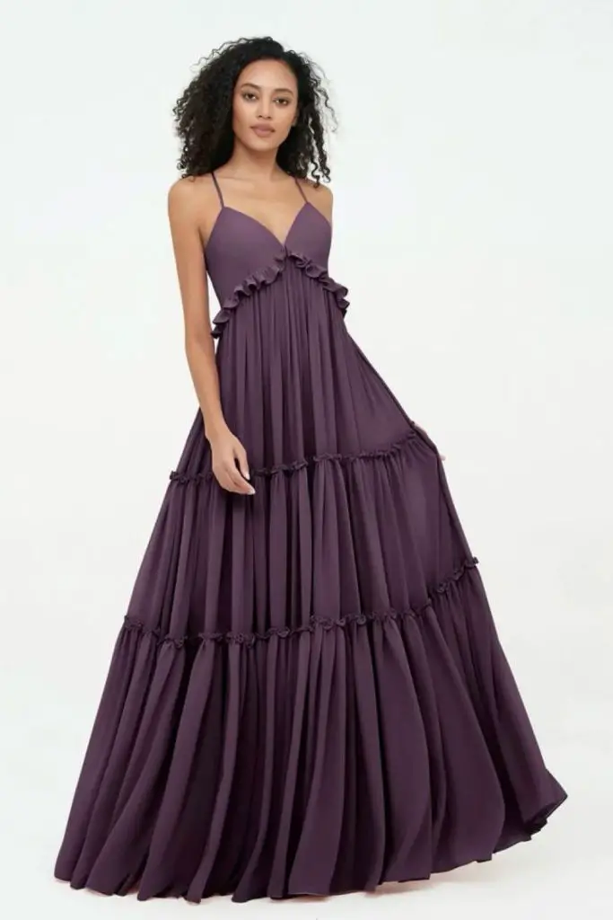 "Plum dress with wide, flowing skirt."