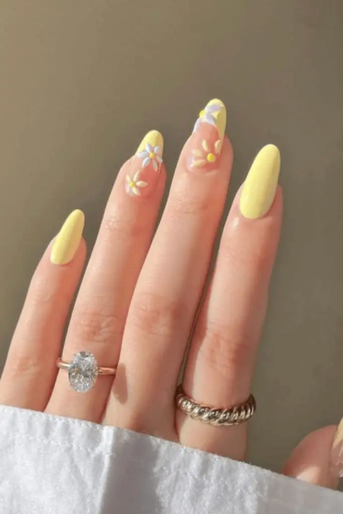 Pastel nails with mini yellow flowers