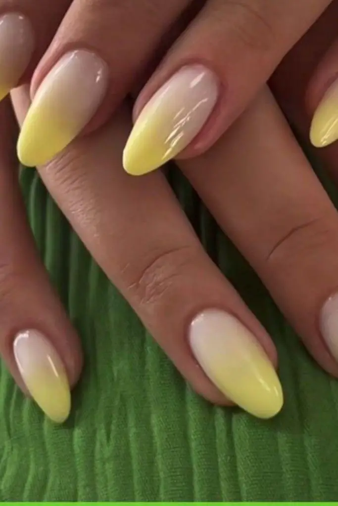 Clear pastel yellow nails with shine.
