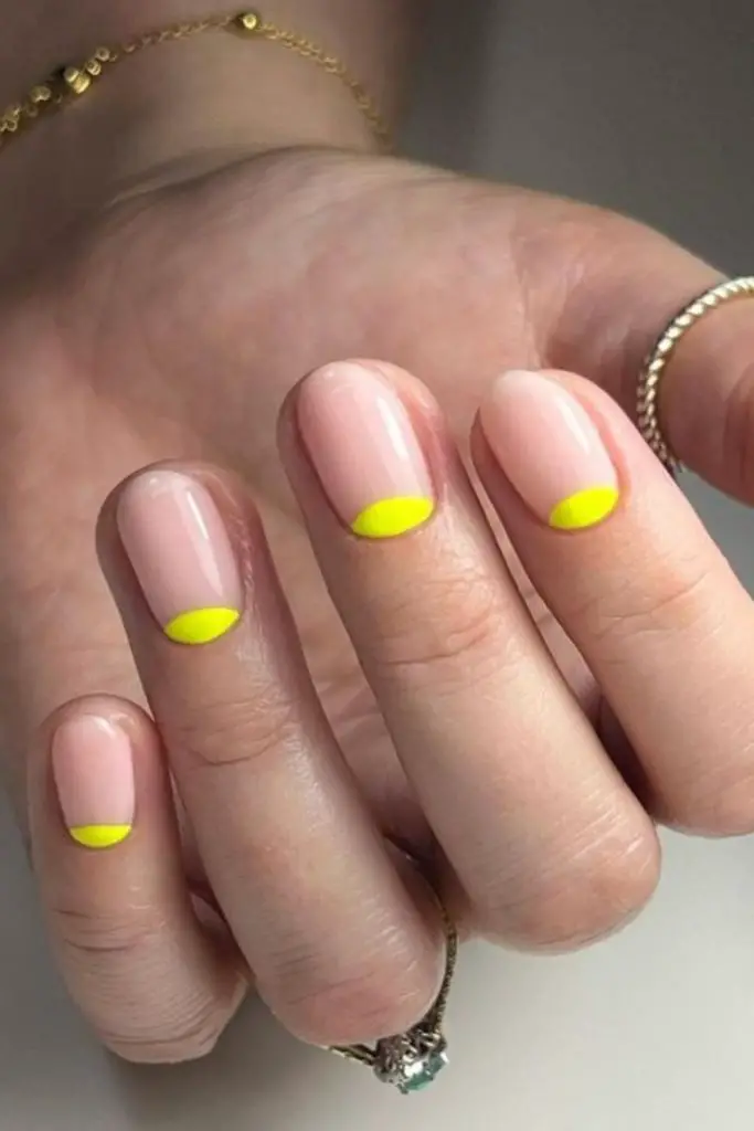 Half-moon pastel yellow with nude tops.