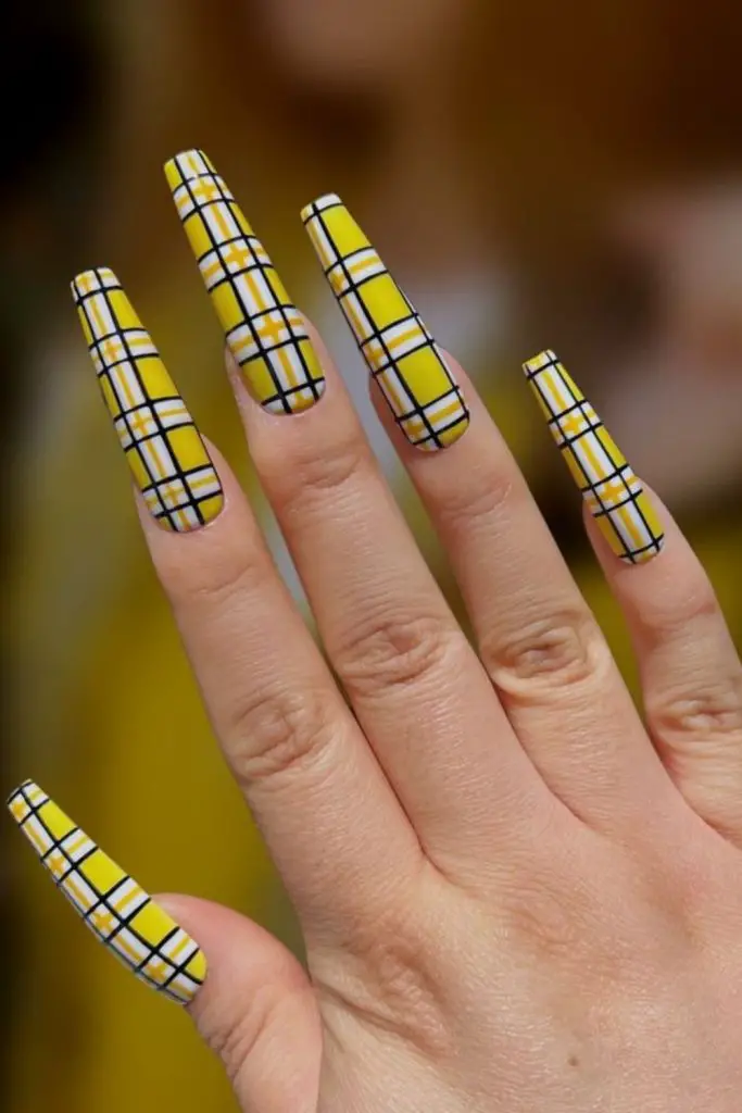 Plaid grid design over mustard yellow.