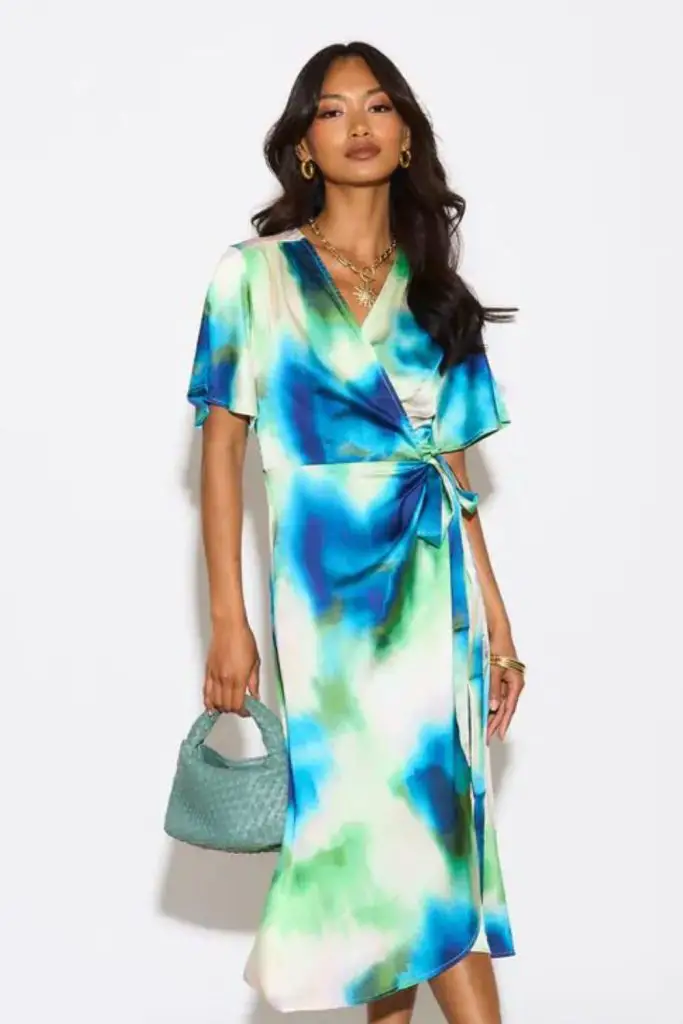 Tie-dye wrap dress with vibrant hues.