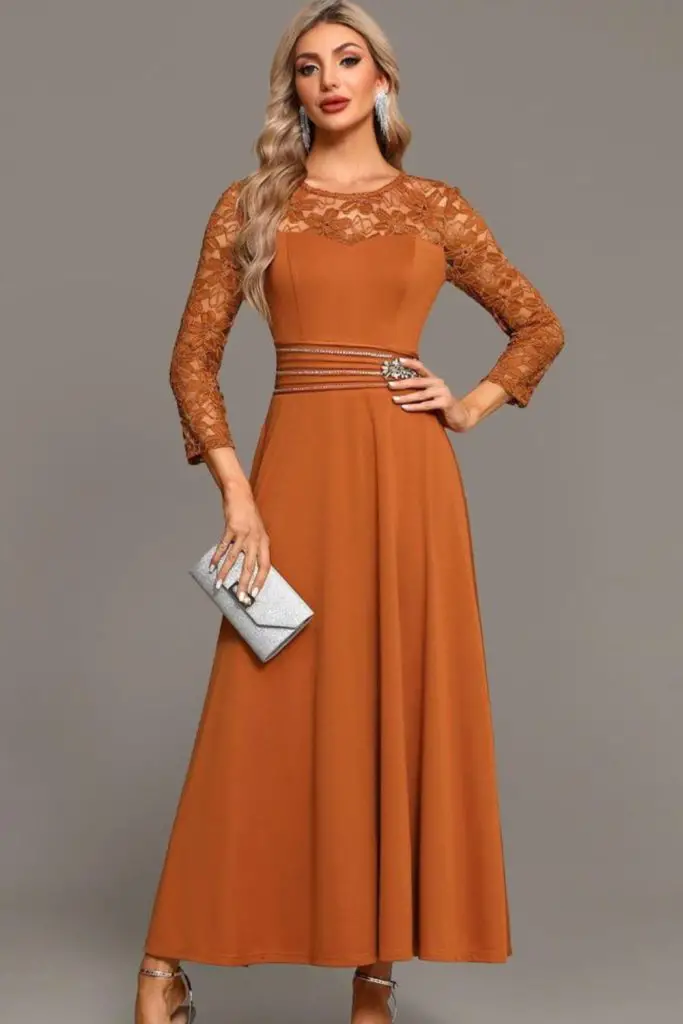 "Rust-colored dress with relaxed fit."