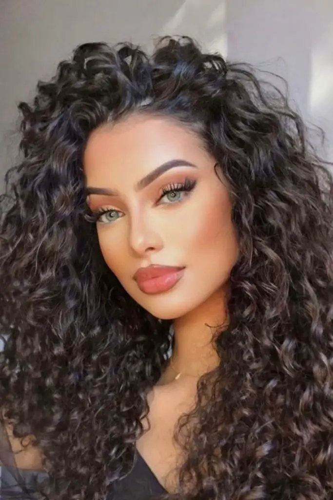 Floating curls with flipped dreamy part.