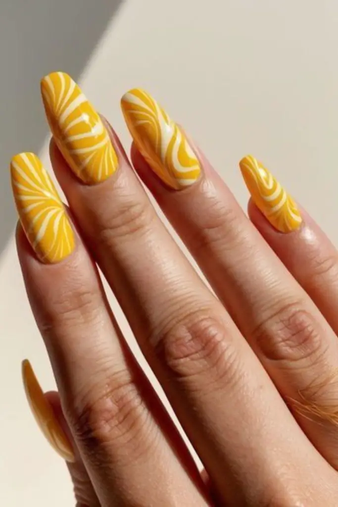 Yellow nails with white vertical lines