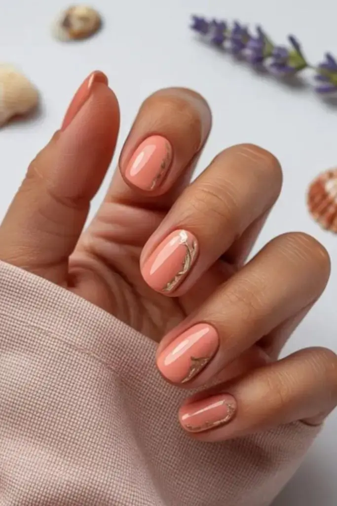 Soft coral ombre nails with shimmer