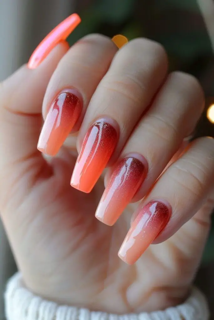 Glossy blush coral nails with loops