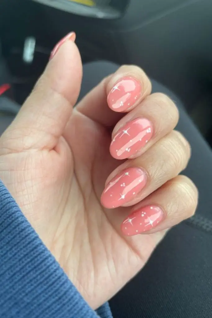 Ombre peach nails with silver stars