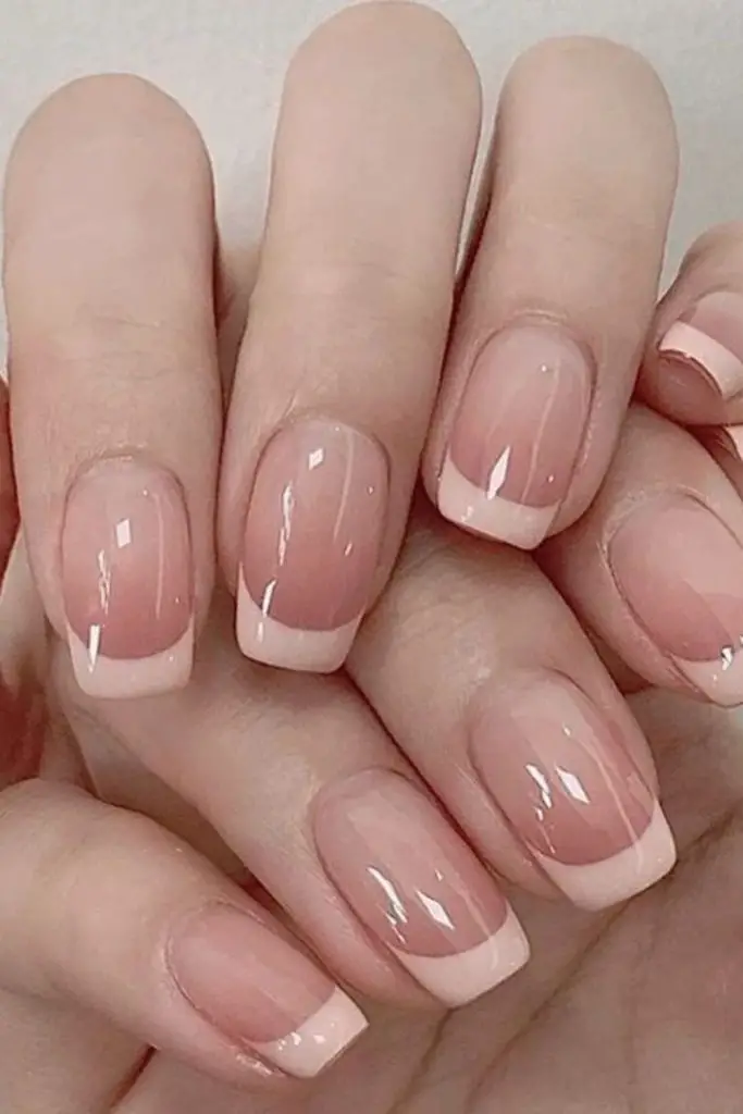 Nude base with creamy French tips.