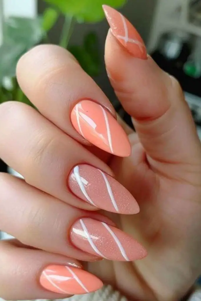 Matte peach nails with line art