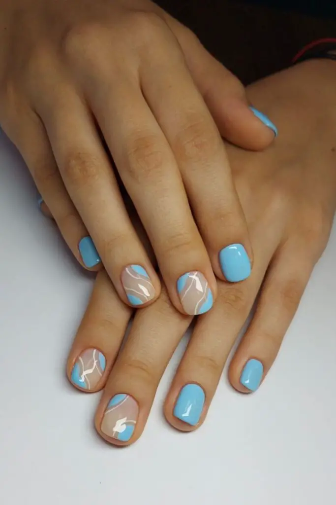 Blue cream swirl nails for summer