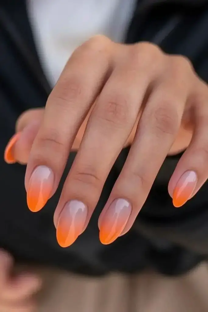 Faded cantaloupe orange ombré short nails