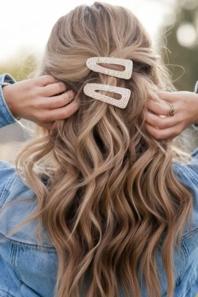 Scattered clips over soft wavy hair.