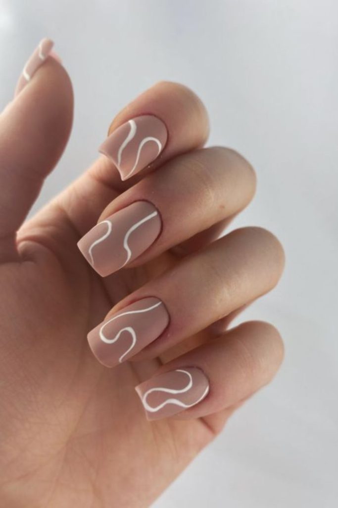 Mocha nails with minimal white stripes