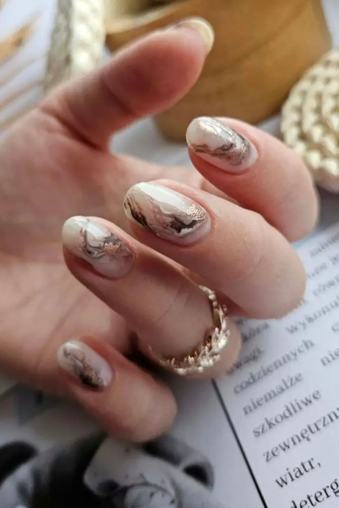 Beige marble textured summer nail look