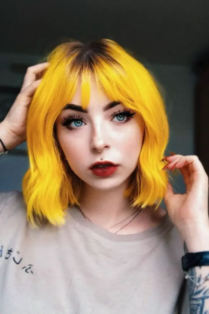  Yellow bob with electric uneven bangs