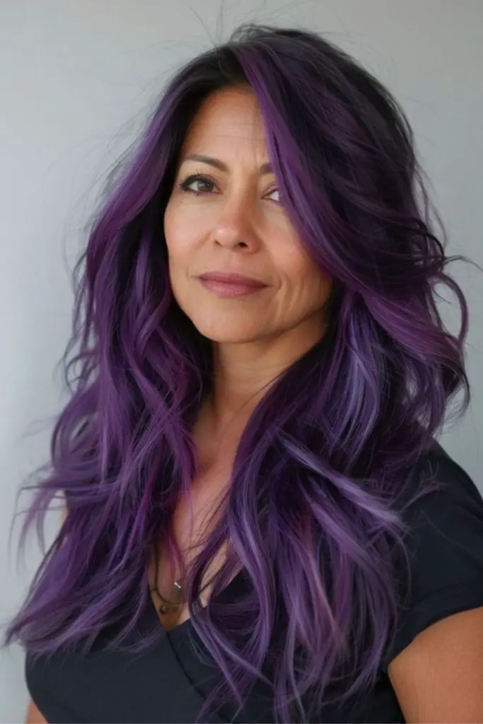 Dark purple curls with side part