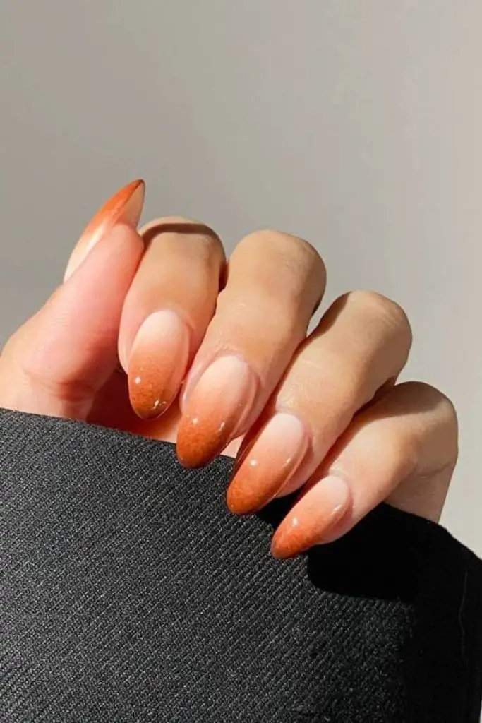 Peach to sand faded smoky nails