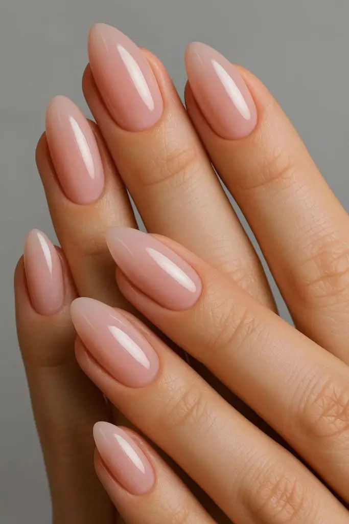 Soft pink quartz-inspired glossy nails