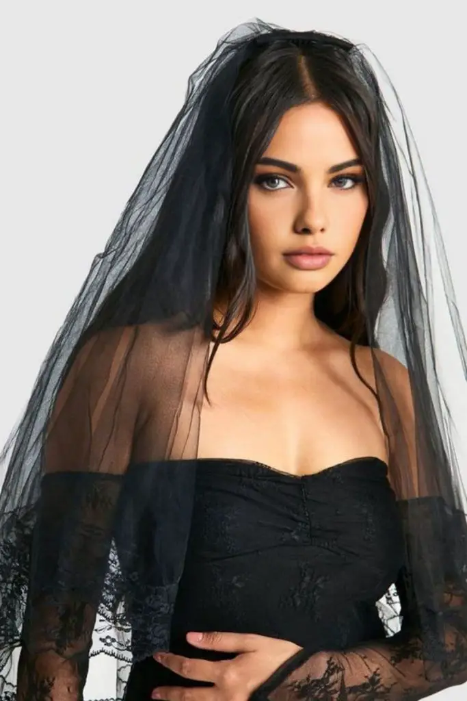 Haunted bride with veiled black tresses