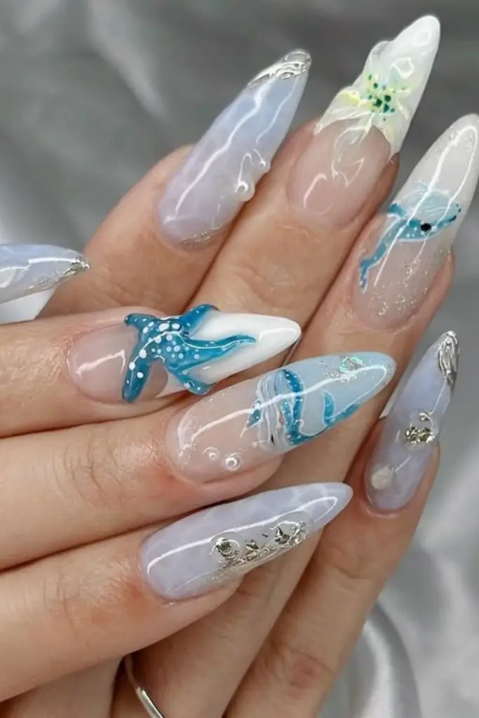 Sheer off-white nails with chalk specks.