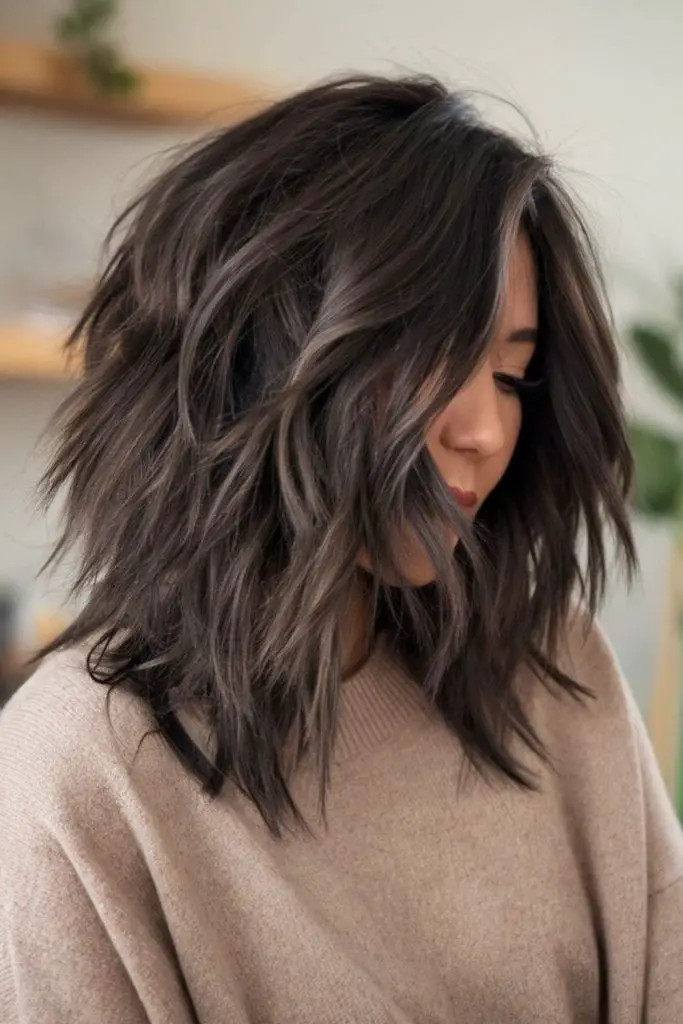 Smoky bob curling into soft layers
