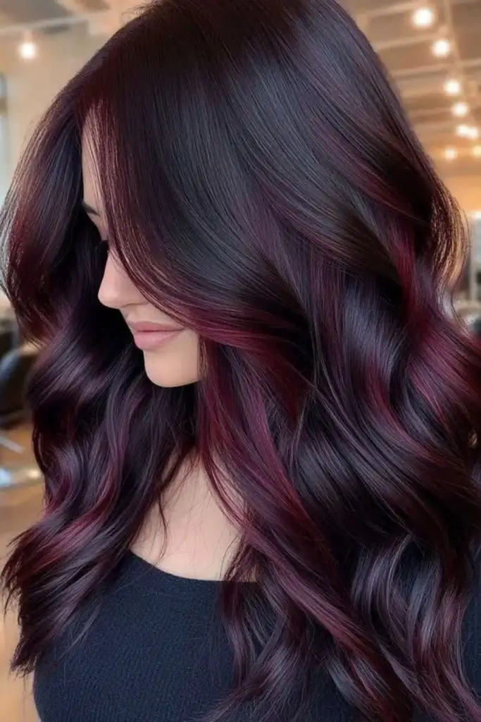 Subtle cherry hues over smoky base